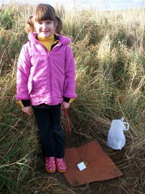 Here is Phoebe planting
her tree. 