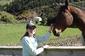 Student with horse. 