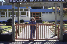 Student at school gate. 