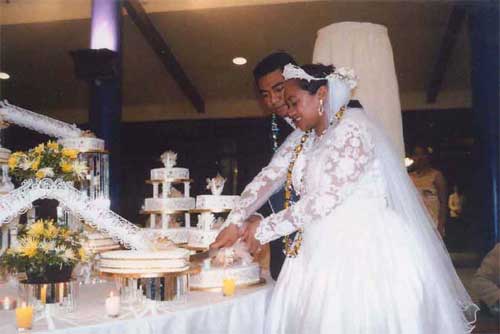 Vera's sister and brother in law cutting the cake. 