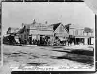 The corner of Cashel and High Streets ca.1880: Note Cobb & Co. building File Reference: CCL Photo Collection 22, Img00803. 